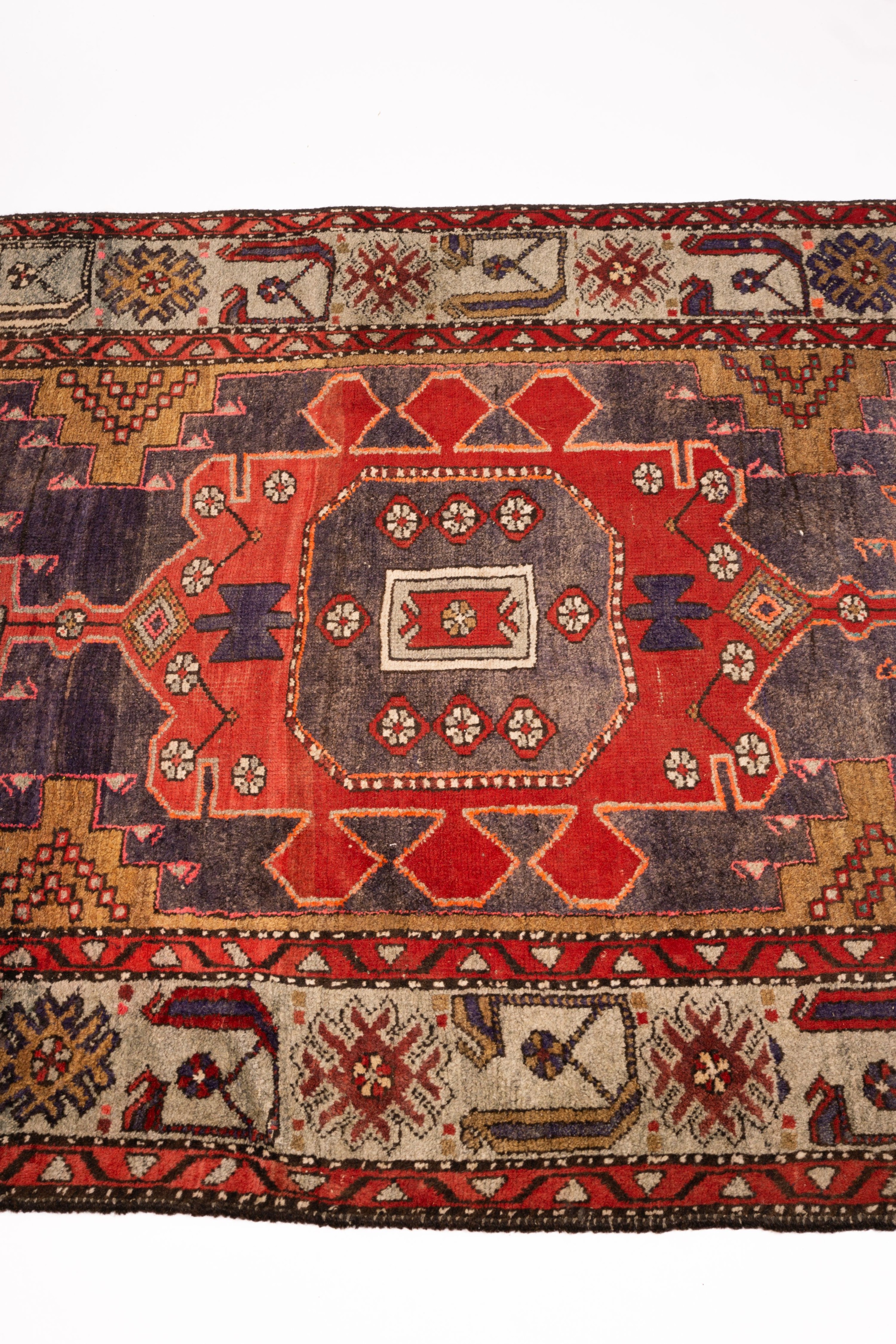 A Caucasian Kazak blue ground rug, 206 x 128cm